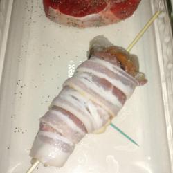 Spiny lobster wrapped in bacon and ready for cooking Spiny lobster wrapped in bacon and ready for cooking